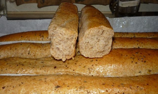Broken bread showing crust and crumb