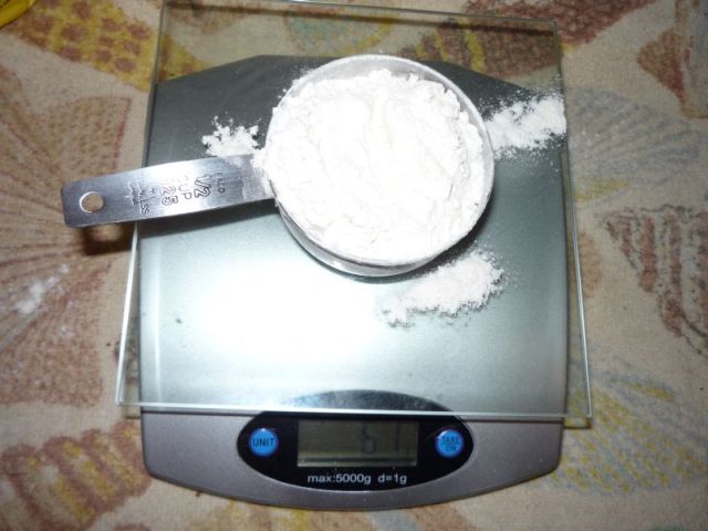 Weighing 60 grams of flour.