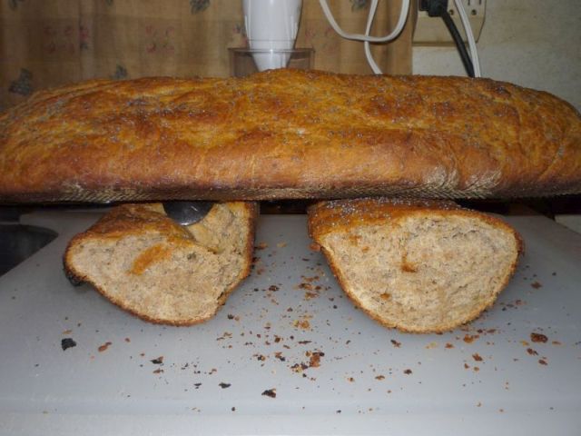 Broken bread showing a nice crumb.