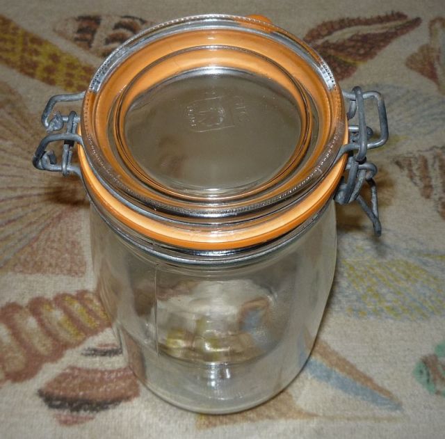 Old glass jar with wire bail-snap lid