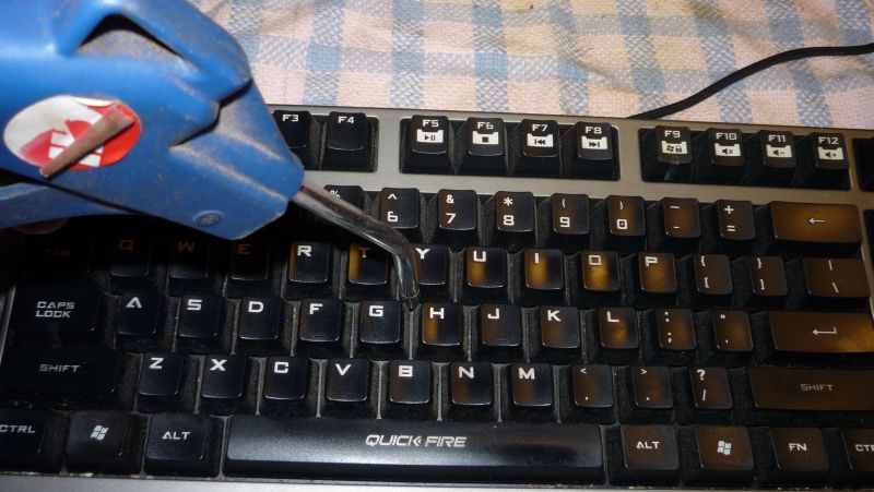 nozzle positioned at keyboard keys