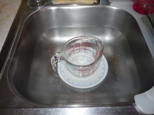 Water cup in sink water